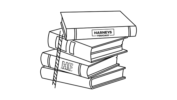 A pair of glasses on top of a folder with tags sticking out